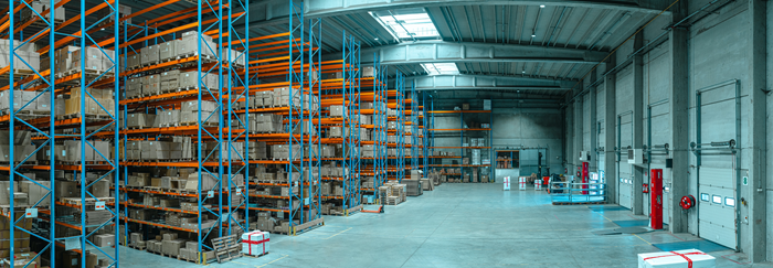 warehouse with shelves full of boxes